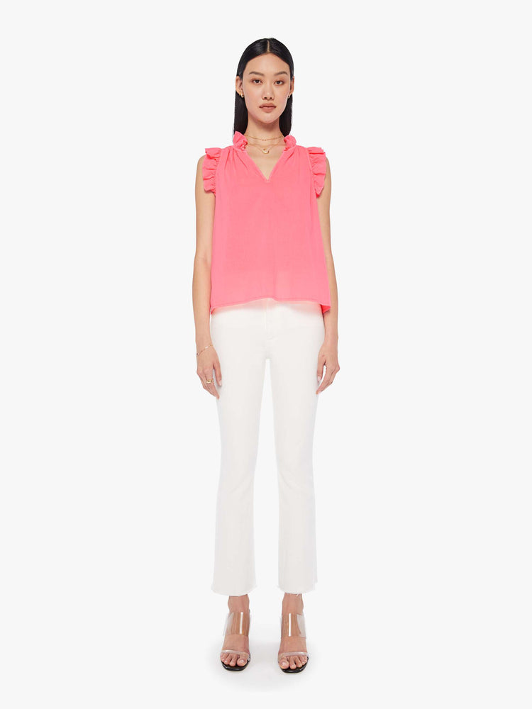 Front full body view of a womens neon pink blouse featuring sleeveless ruffles and a v neck.