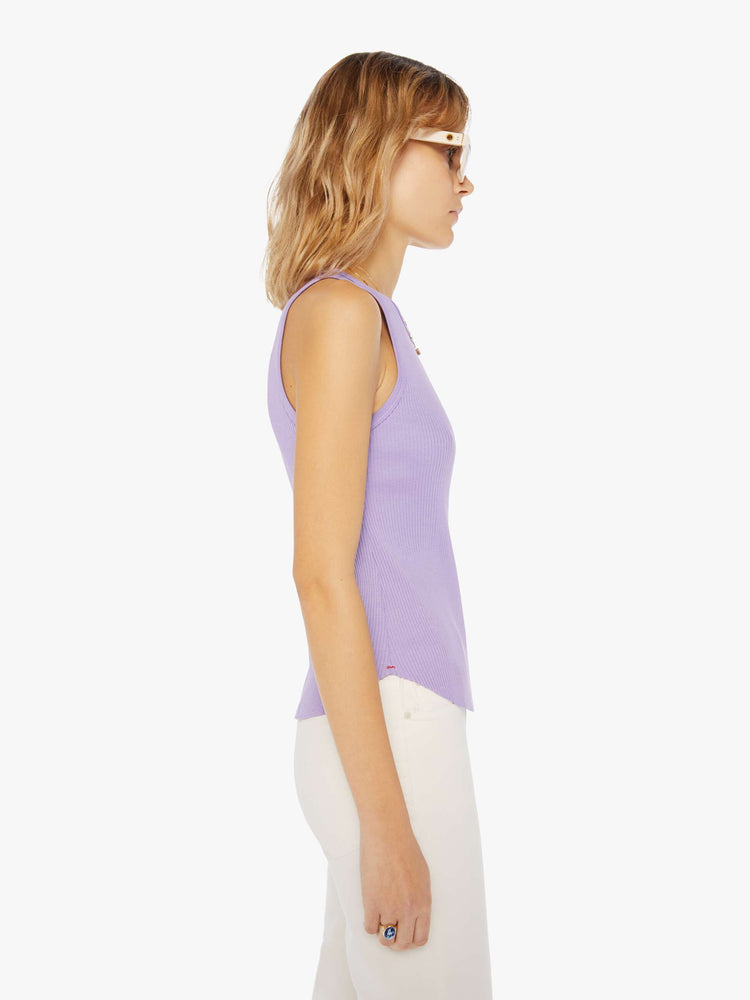 Side view of a light purple tank top featuring a fitted body and curved hem.
