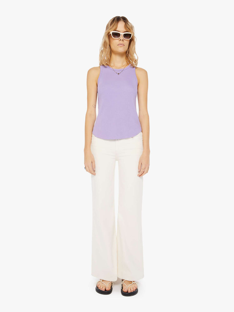 Front full body view of a light purple tank top featuring a fitted body and curved hem.
