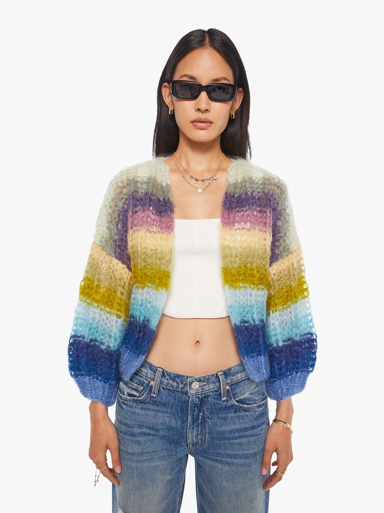 Font view of a woman in  ribbed cardigan is hand knit from a soft blend of mohair and wool in a multicolor horizontal stripe pattern.