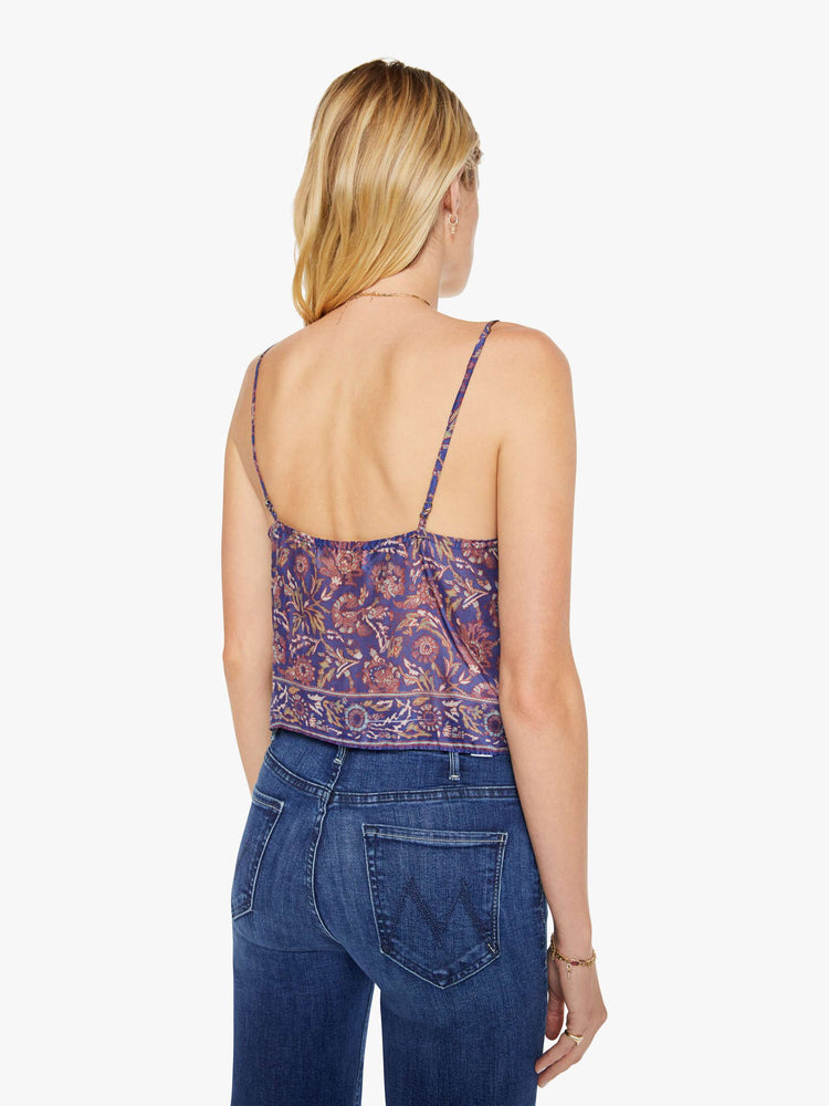 Back view of a woman in a blue and pink floral print, the Fern cami has a square neck, spaghetti straps and a cropped, boxy fit.
