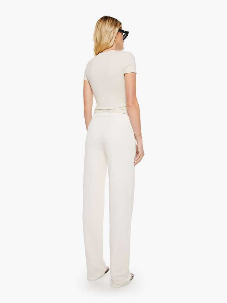 Back view of a woman in  with a straight leg, drawstring waistband, long inseam and a loose, comfortable fit. 