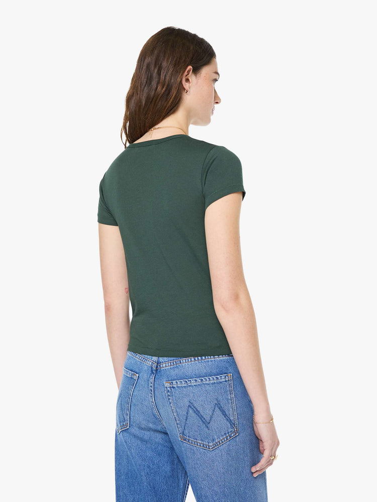 Back view of a woman in a forest green crewneck tee is designed with short sleeves and a narrow fit.