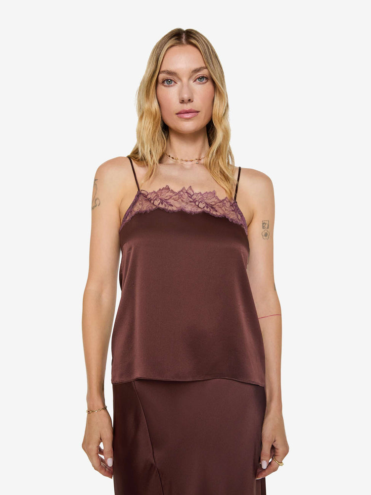 Front view of a woman in a silk in a chocolate brown with lace trim, the cami is designed with a square neck, thin spaghetti straps and a loose, boxy fit.