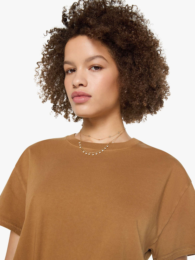 Front close up view of a womens crew neck tee with a boxy fit in a dark khaki.