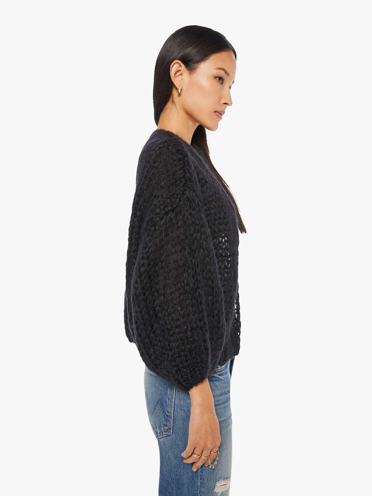 Side view of women's Mohair Cardigan Sweater in Black.