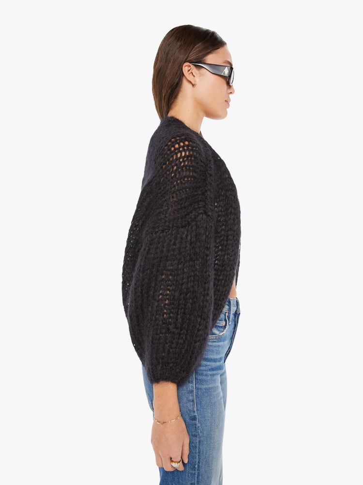 Side view of women's Mohair Cardigan Sweater in Black.