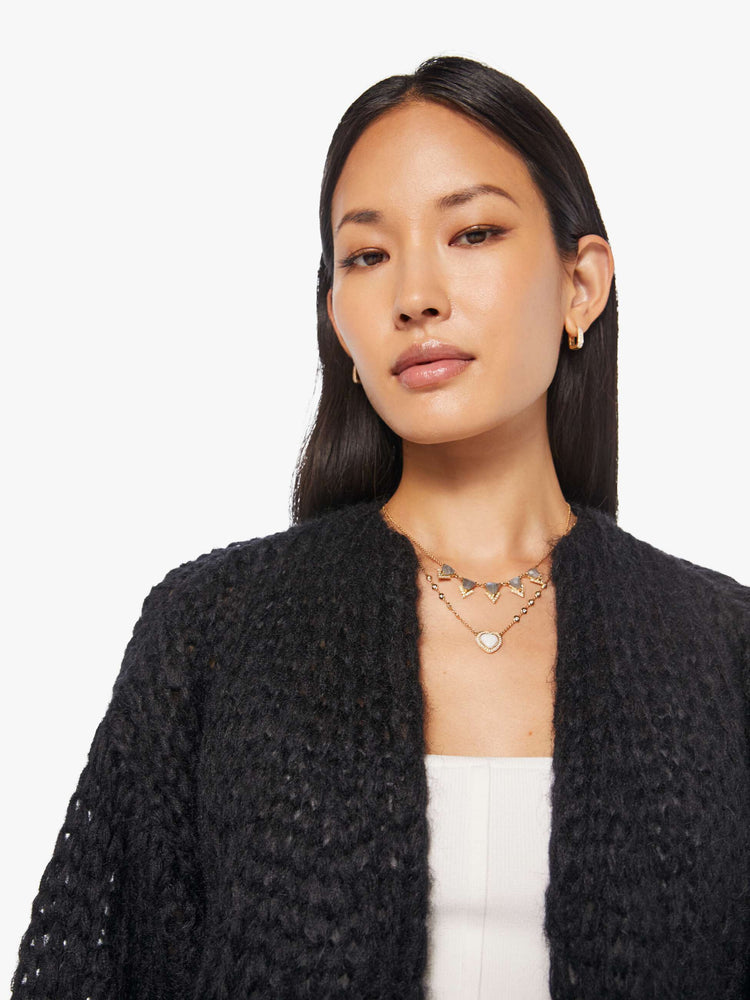 Close up view of women's Mohair Cardigan Sweater in Black.
