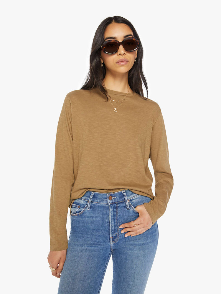 Front view of a woman olive long-sleeve crewneck with a slightly boxy shape.