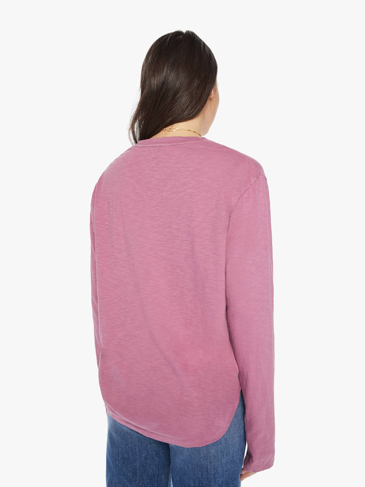 Back view of a woman plum long-sleeve crewneck with a slightly boxy shape.