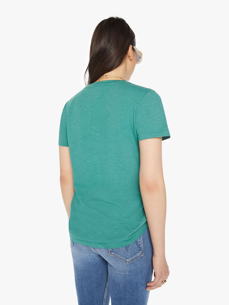 Back view of a woman faded green crewneck with a slightly boxy shape.