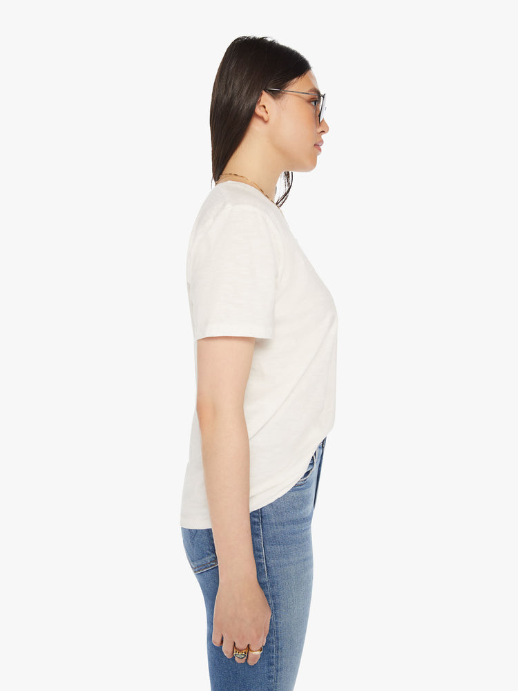 Side view of a womens white crew neck tee.