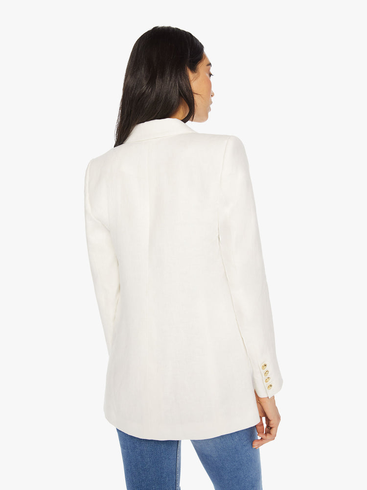 Back view of woman white v-neck blazer with an extra-wide collar, padded shoulders and a button closure.