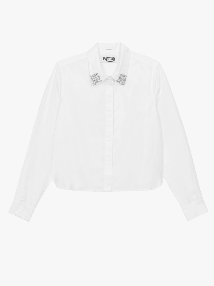 Flat view of a white button up with  cropped fit and jewels on the collar.
