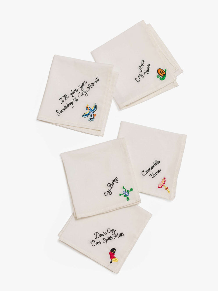 A set of five 8-inch-by-8-inch 100% cotton handkerchiefs in white with black embroidered text and colorful characters in the bottom corner.