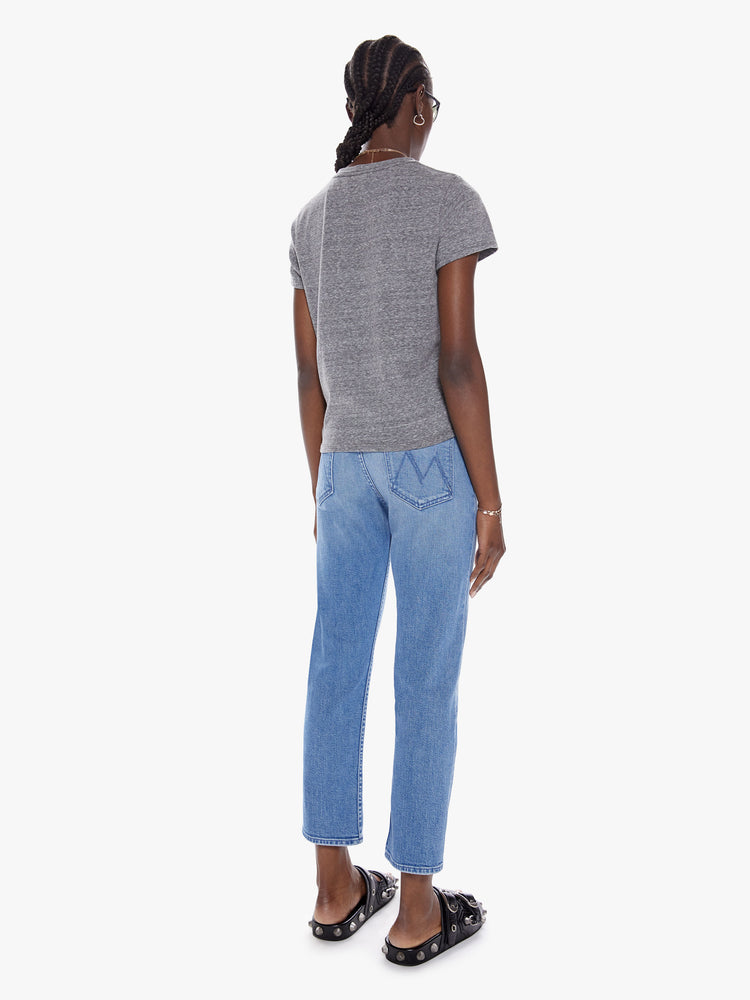 Back view of womens high rise medium blue wash jean with straight leg, ankle length inseam, button fly and fading at the knees.