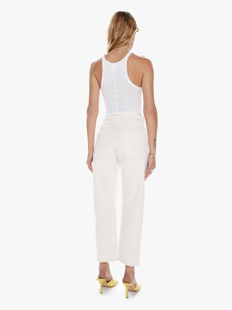 Back view of a womens off white cropped pant with a button fly, slouchy straight leg and relaxed fit