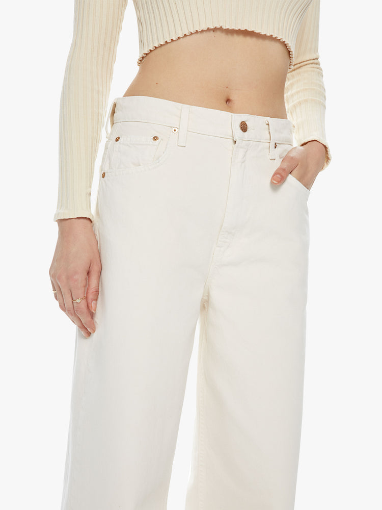 Front detail view of a women's ivory wide leg jean. This style is inspired by the fit of 90s jeans.