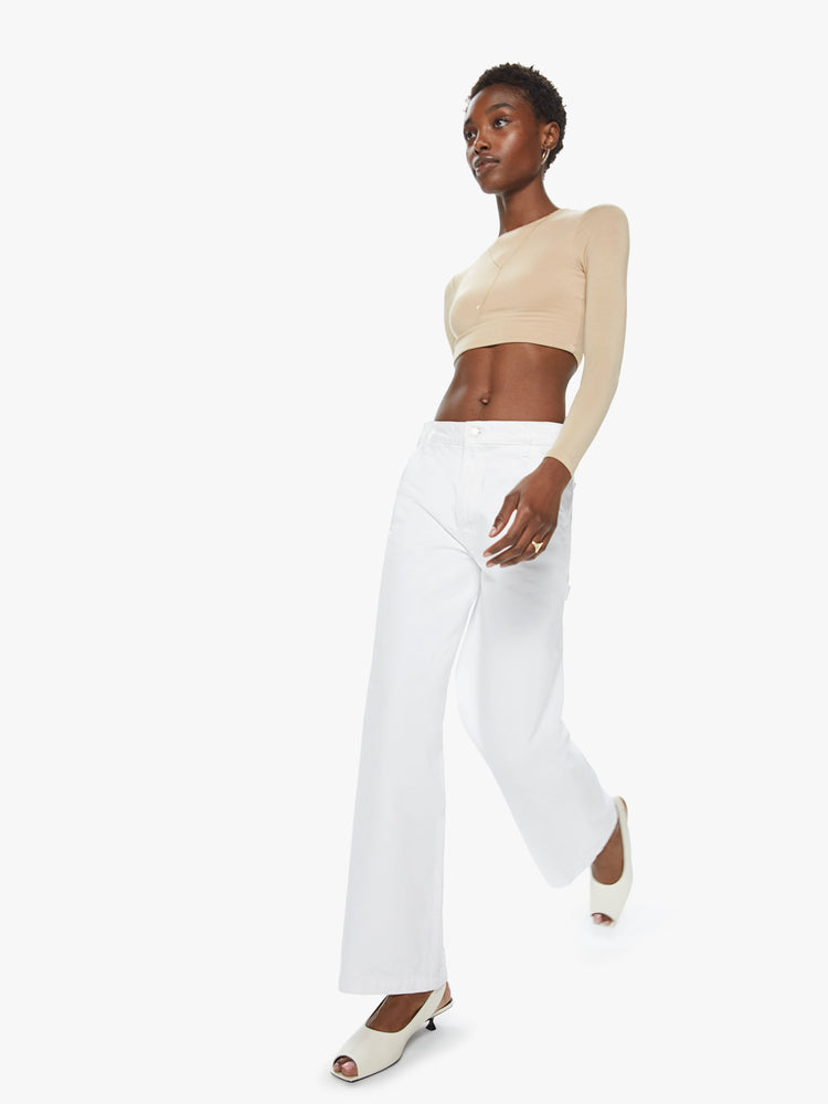 Full front view of a women's white wide leg utility style jean. This style is inspired by the fit of 90s jeans.