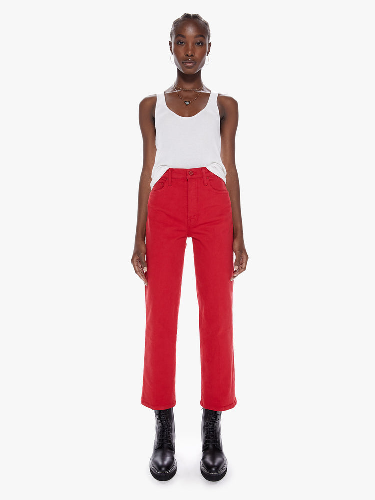 Front view of a womens bright red high waisted wide straight leg pant with an ankle length inseam and button fly.