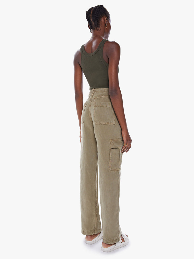 Back view of a woman's High-waisted cargo pants with a wide straight leg, patch pockets and a clean 32-inch inseam in an olive green hue.