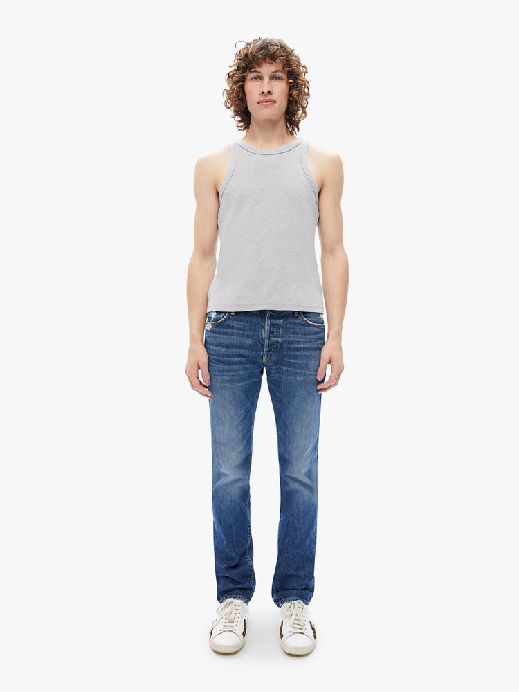 Front view of men slim-straight leg with a mid rise, 32-inch inseam and a clean hem in a dark blue wash