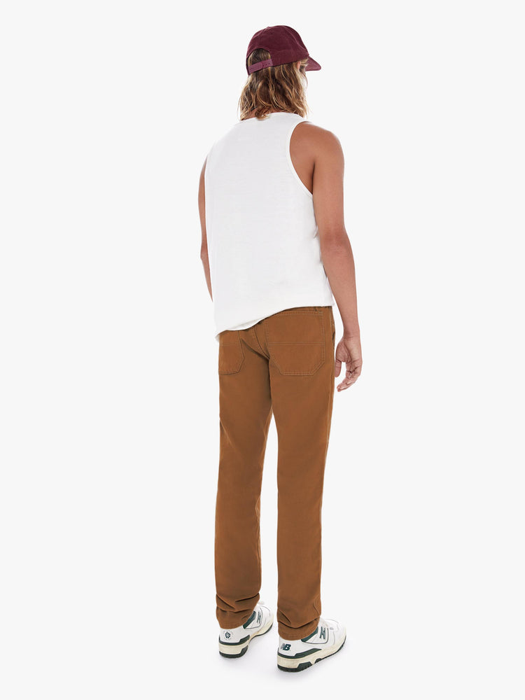 Back view of a men's brown utility style straight leg pant