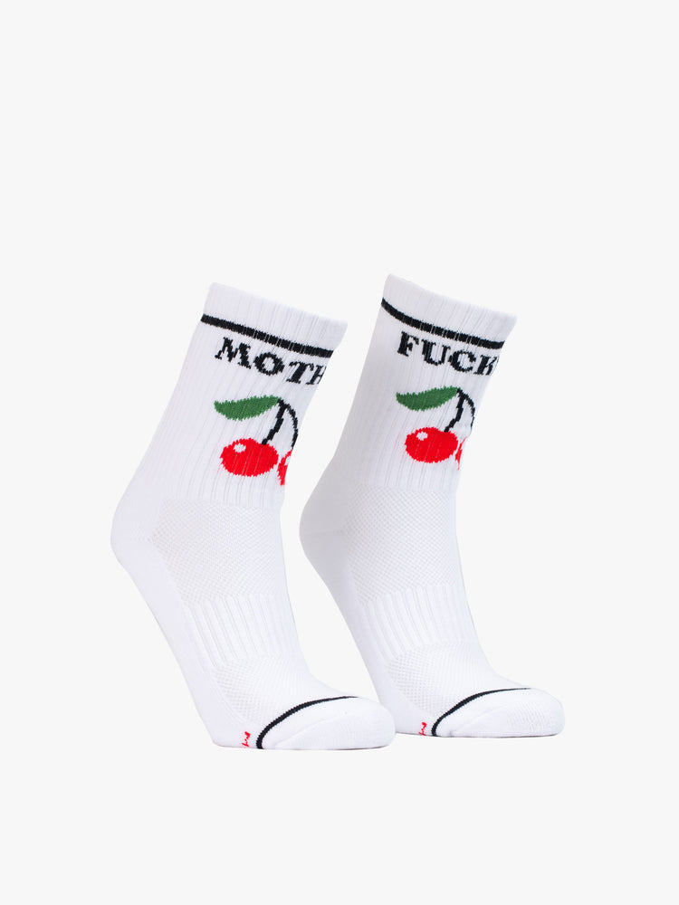 Side view of classic tube socks with a subtle message shown here in white with black lettering and a red cherry graphic on the front.