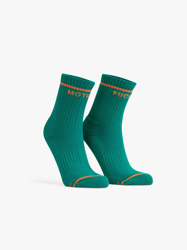 Front view of a pair of green socks with oranges stripes and the words MOTHER FUCKER.