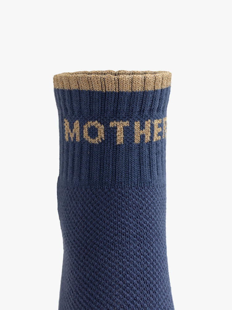 Front view of a slate blue sock with grey tube stripe and toe stripe and "mother fucker" graphic
