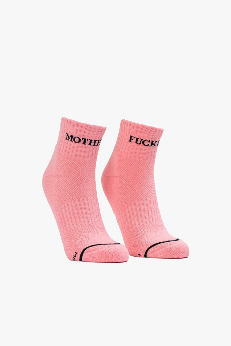 Front view of a light pink women's ankle tube sock featuring "MOTHER FUCKER" in black across the front with a black toe stripe