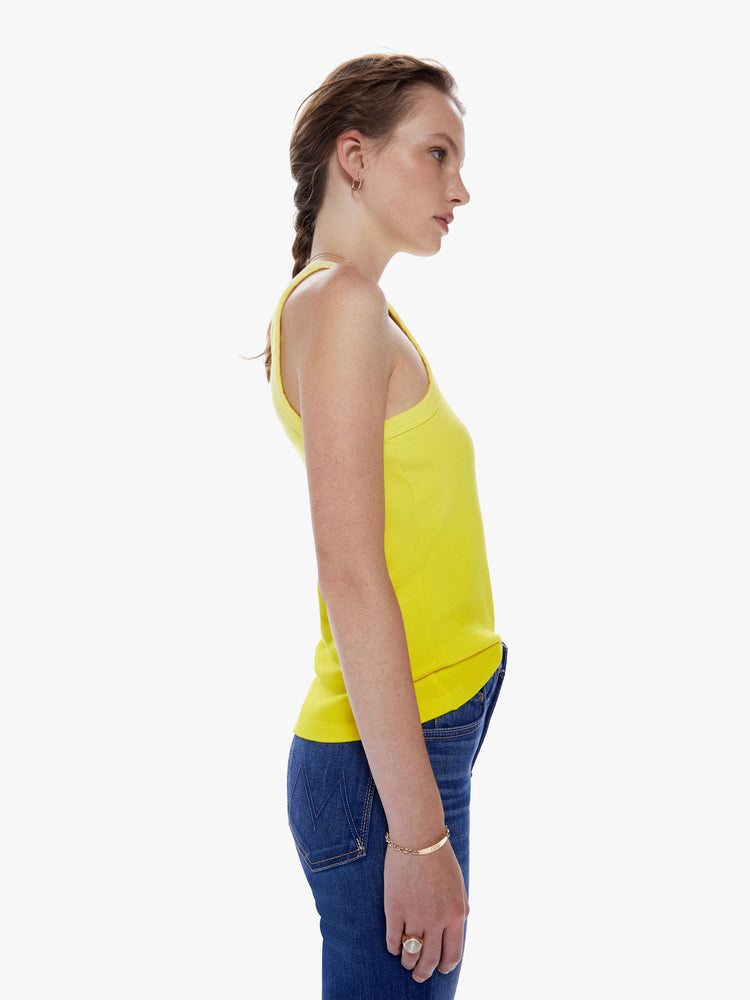 Side view of a dip dyed yellow hue view of a woman dip dyed periwinkle hue Tank features a slim fit and racer-style straps.