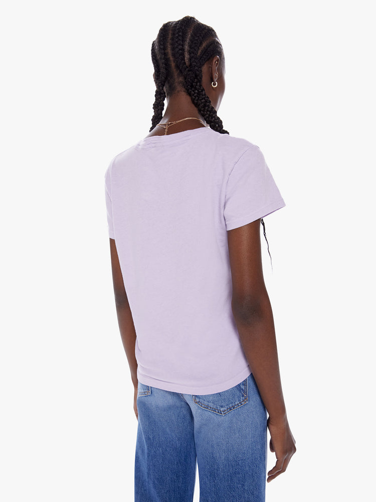 Back view of a womans crewneck with a slim fit for a vintage look and feel. Made from a recycled cotton blend in a soft lavender hue, the tee features yellow text on the front.