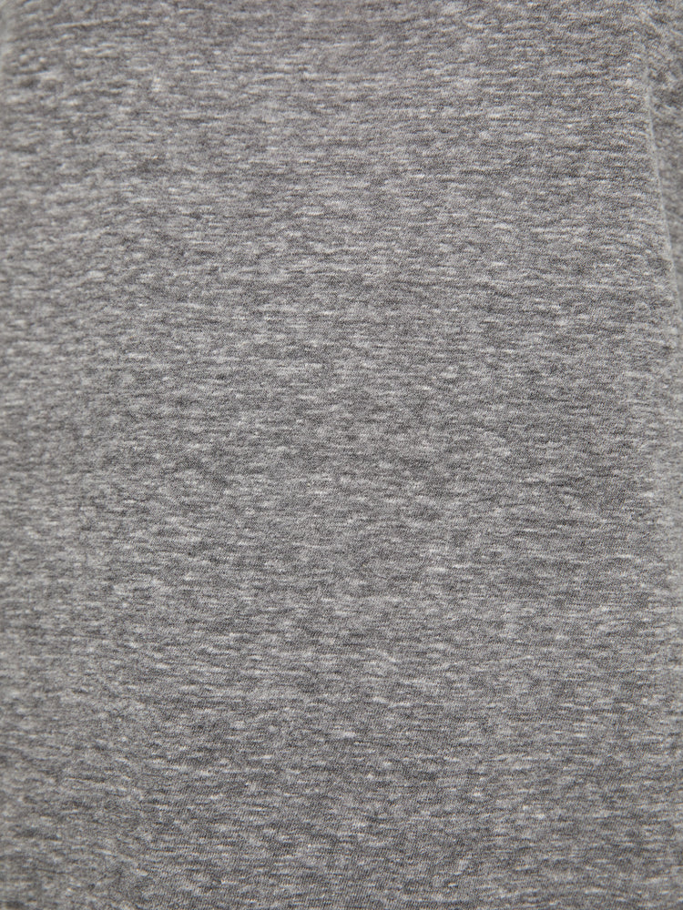 Close up view of a heather grey fabric.