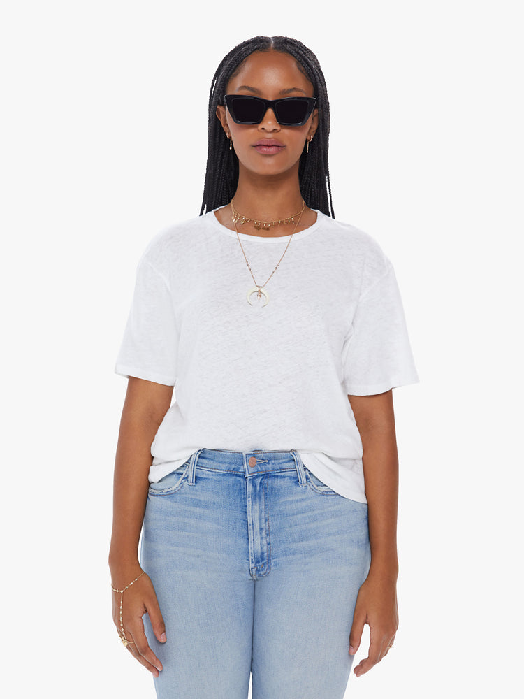 Front view of a womens white crew neck tee in a slub fabric featuring an oversized fit.