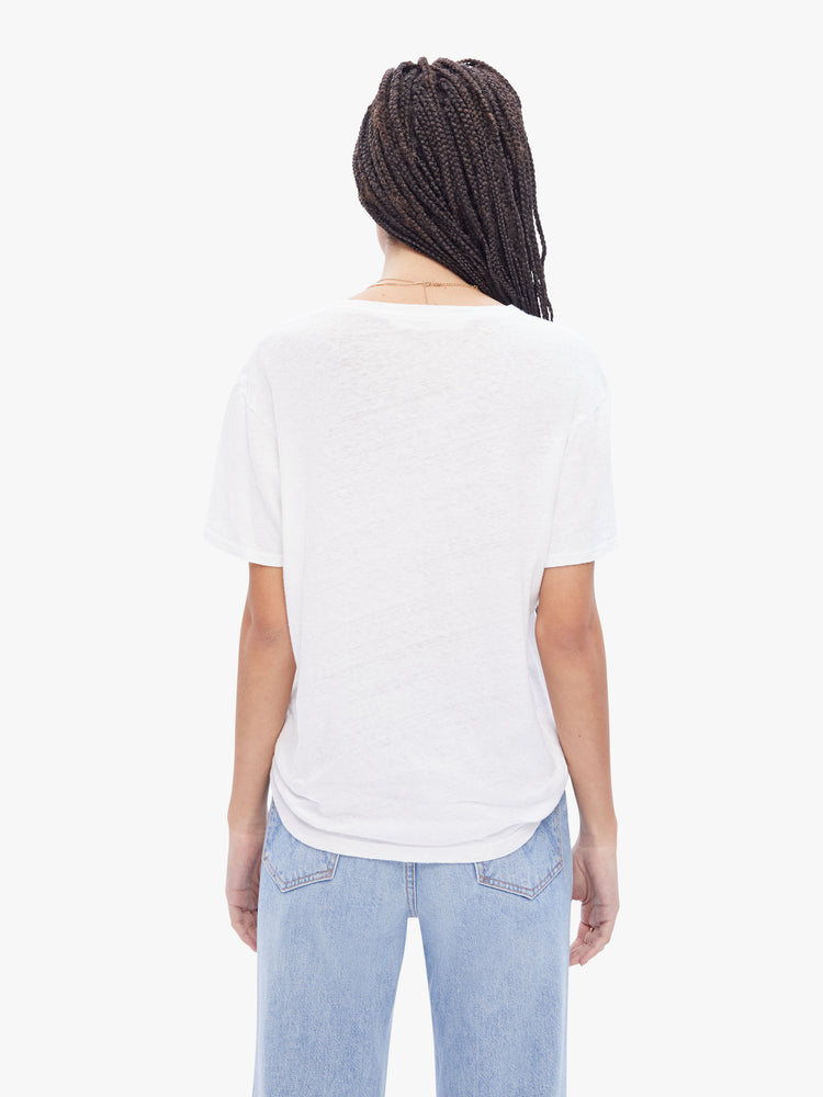 Back view of a womens white crew neck tee in a slub fabric featuring an oversized fit.