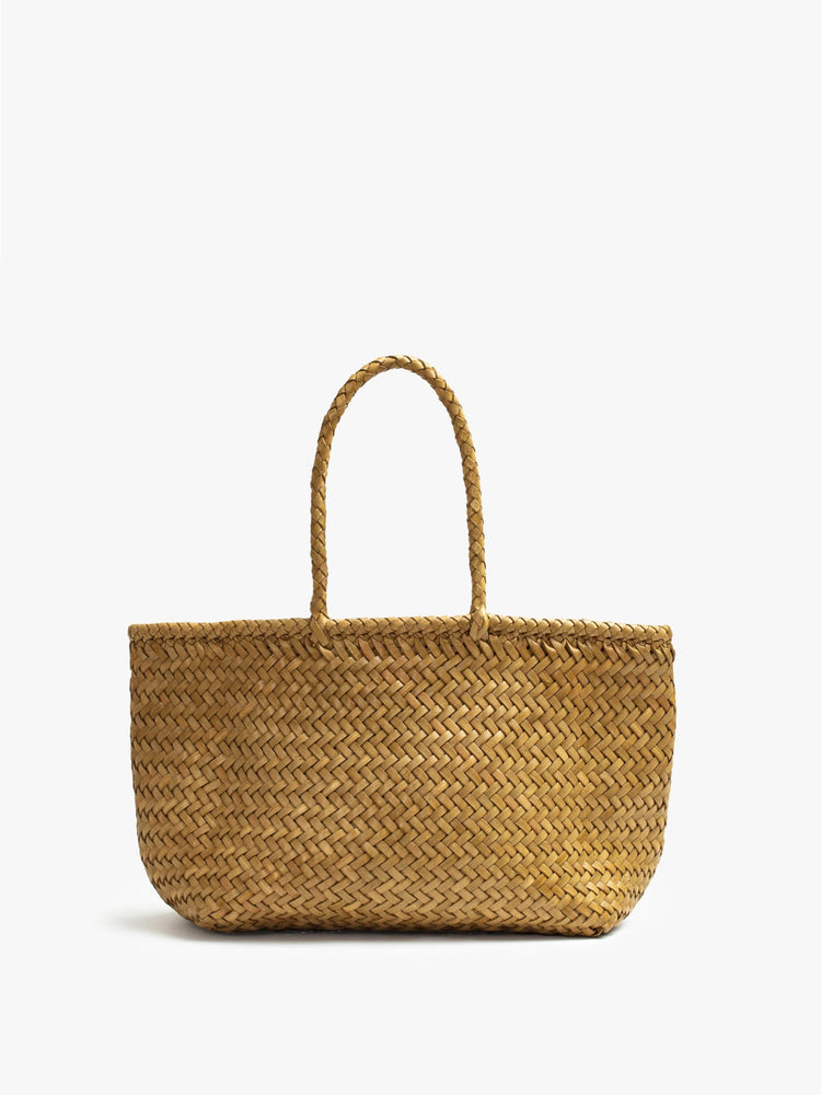 Front view of a tan, woven leather bag.