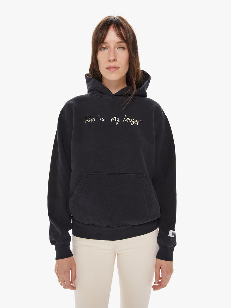 FRONT VIEW WOMEN'S BLACK HOODIE WITH WHITE TEXT