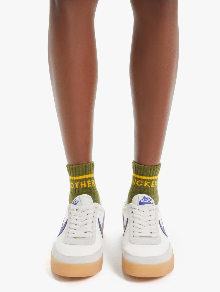 FRONT VIEW WOMEN'S ANKLE SOCKS IN DARK GREEN WITH YELLOW LETTERING