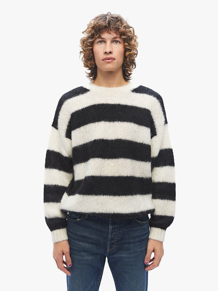 Front view of a mens knit sweater featuring black and white stripes.