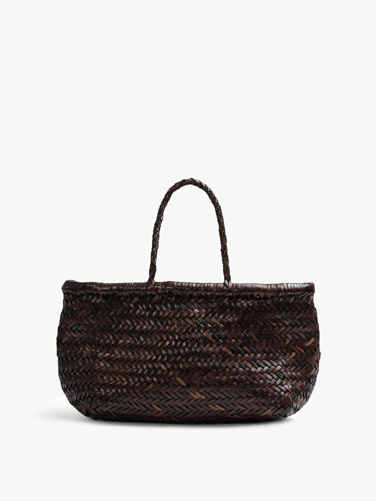 Front view of a dark brown, woven leather bag.