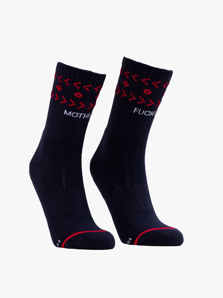 Front view of a pair of black socks featuring a red pattern and text in white.
