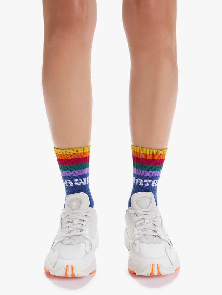 FRONT VIEW WOMEN'S YELLOW BLUE AND RED PURPLE GREEN SOCK READING "DAWN PATROL"