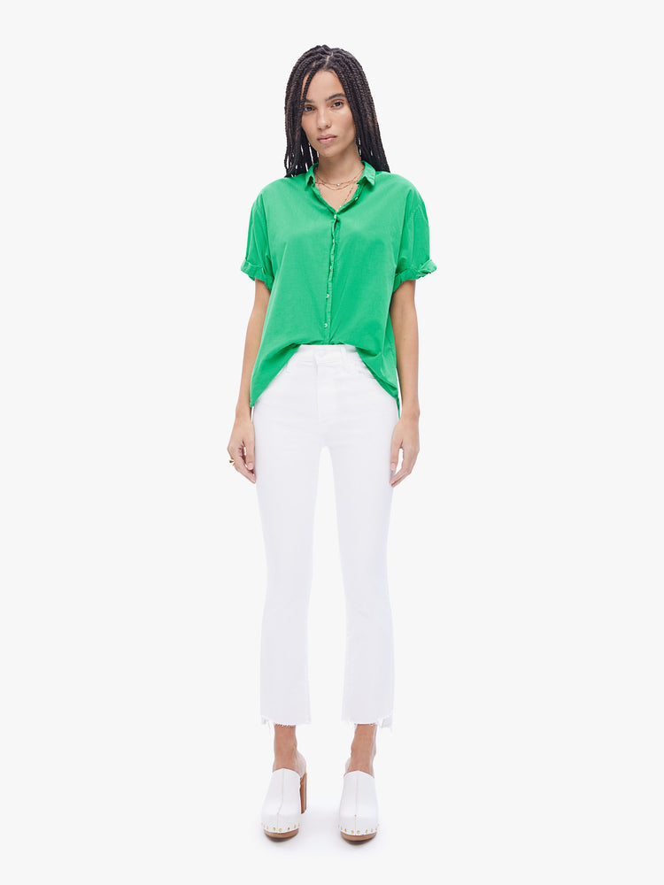 Full body view of an woman in a effortless button down from XiRENA, the collared shirt has a barrowed from the boys look and a slightly oversized fit in a mint green hue