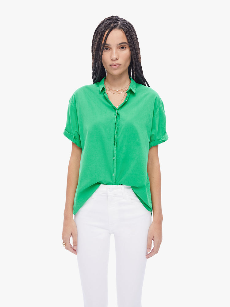 Front view of a woman in an effortless button down from XiRENA, the collared shirt has a barrowed from the boys look and a slightly oversized fit in a mint green hue