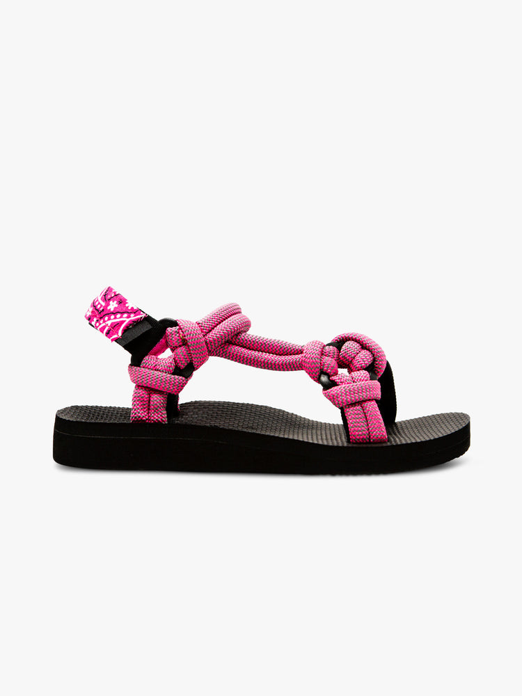 Side view of a velcro sandal featuring a black foam sole and thick pink rope straps.