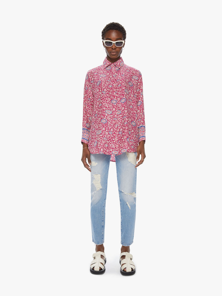 Full front view of women's bright pink button front long sleeve shirt with all over floral print