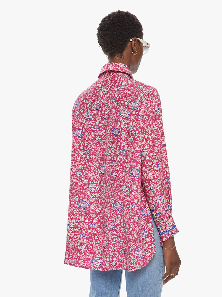 Back view of women's bright pink button front long sleeve shirt with all over floral print