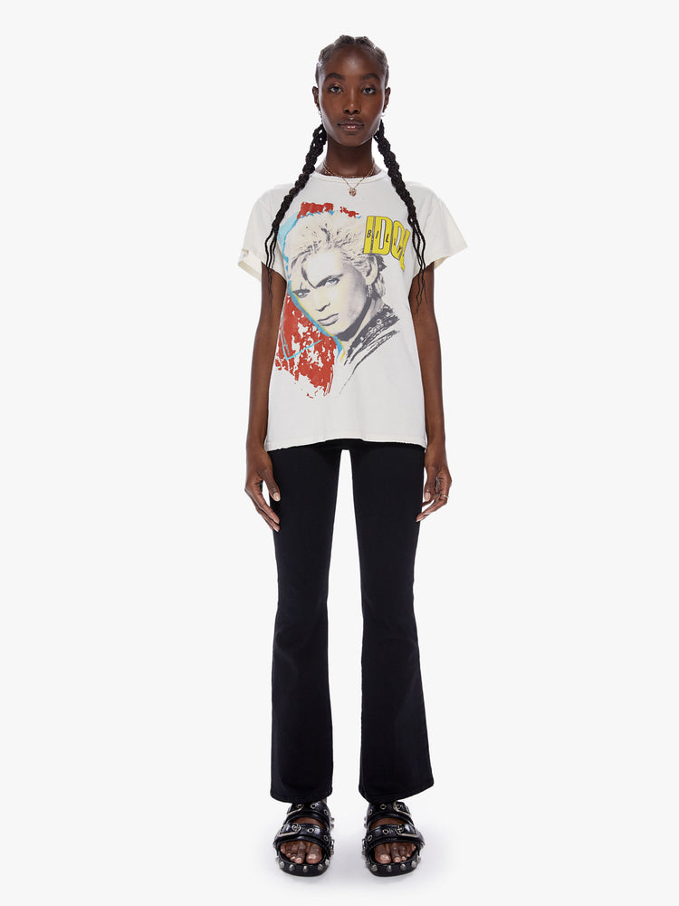 Front full body view of a woman wearing an off white crew neck tee featuring a large Billy Idol graphic and an oversized fit.
