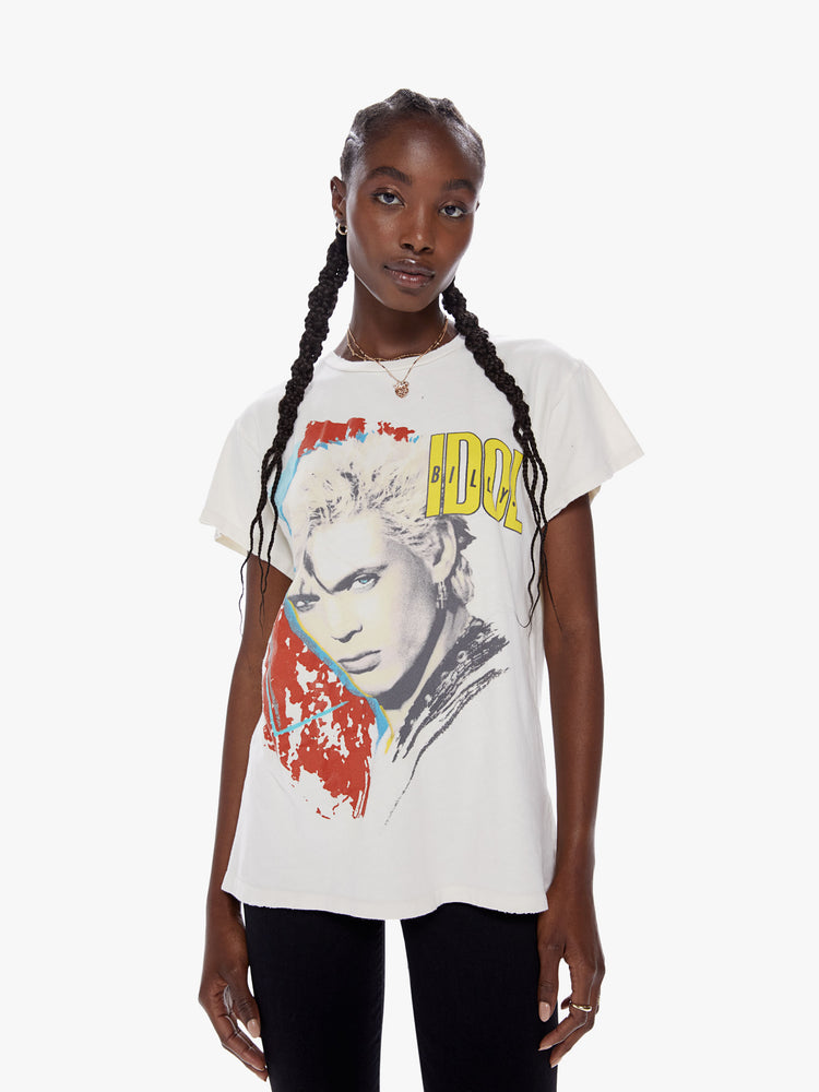 Front view of a woman wearing an off white crew neck tee featuring a large Billy Idol graphic and an oversized fit.